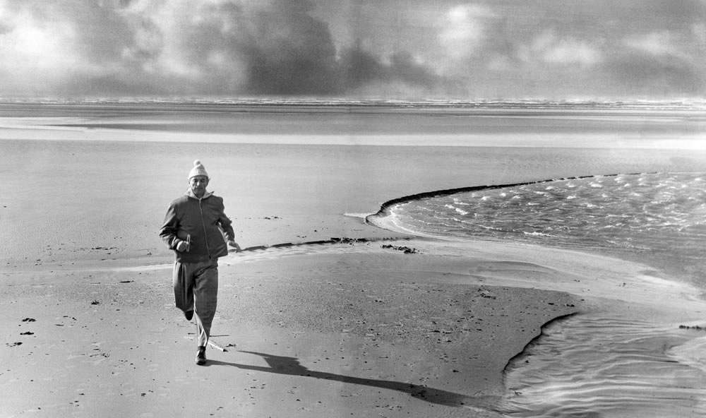 Stanley Matthews seen here training on an expanse of Blackpool Beach,.. Art Print